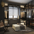 open wardrobe with wooden closet in bedroom